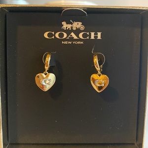 COPY - Authentic Coach Earrings. Silver and gold huggies